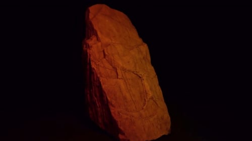 Red Rock Formation on Black Background