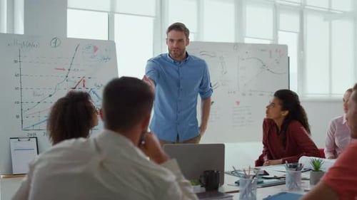 Business Team Meeting for Project Presentation in Office