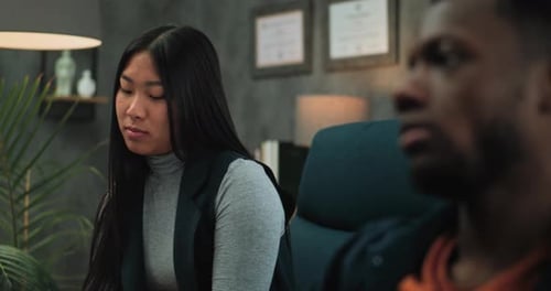 Woman Talking in Therapy Session Indoors