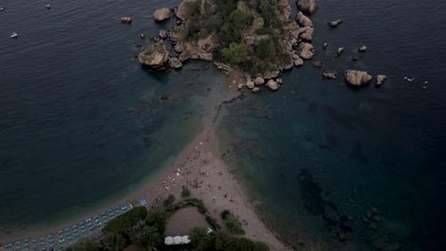 Aerial view of Isola Bella in Taormina, Italy.