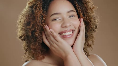 Black woman face, beauty portrait and cosmetic wellness of a model in a studio with happiness