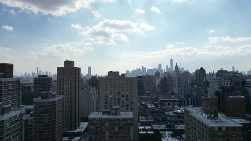 A cinematic rise shot capturing the grandeur of the New York City skyline, unfolding seamlessly from