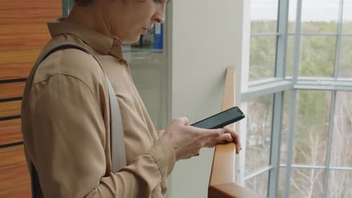 Businesswoman Typing Message on Phone