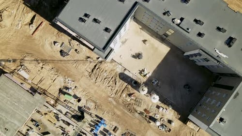 top down from building place with new home during building proces, zoom out aerial