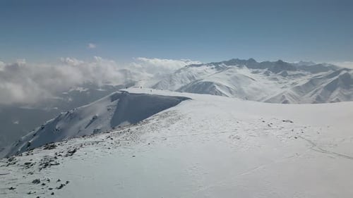 Skiers on Snowcovered Ridges in Gulmarg Kashmir India
