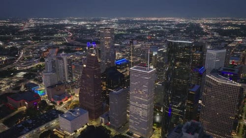 Aerial View of Downtown Houston at Night Showcasing the Illuminated Cityscape and Modern