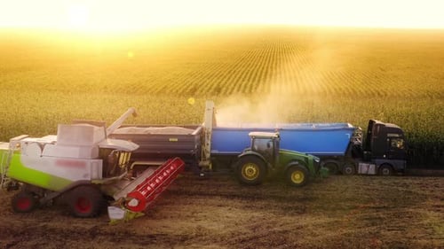 Aerial View of a Tractor Picking Up Yields