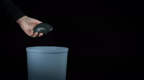 Female Throw Old Electronic Devices in Trash