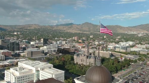 Aerial view of American flag over Salt Lake City
