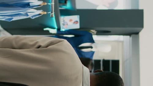 Vertical Video Male Shopper Buying New Shirts for Formal Wear at Mall