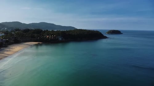 Landscape of Coastline with Sand Beach and Mountain Range at Clear and Warm Summer Day