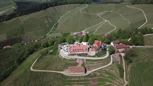 German valley with houses on top of the hill, aerial footage in 4k