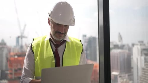 Engineers work in high rise building.