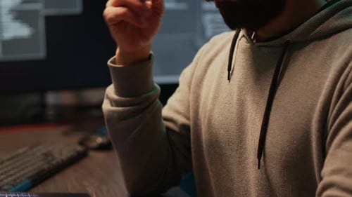 Pensive Database Admin Brainstorming Ideas in Office