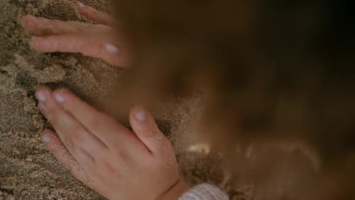 Kid Hands Building Sand Castle on Seashore Weekend Boy Enjoying Game Vertical