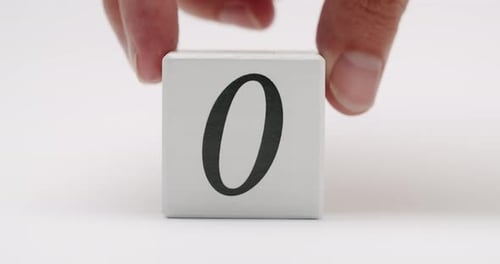 Minimalistic White Block with Number Zero on Blank Background