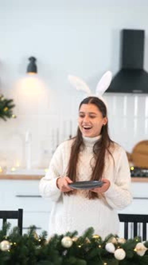 Young Adults Decorating Home for Christmas