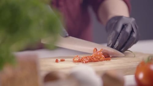 Slicing Red Pepper on Cutting Board
