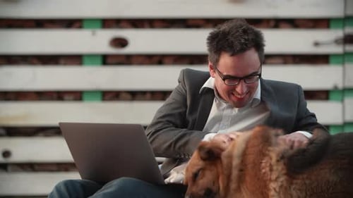 Handsome Man Works Online in the Lounge Zone