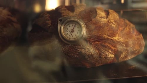 a chef makes bread in a bakery