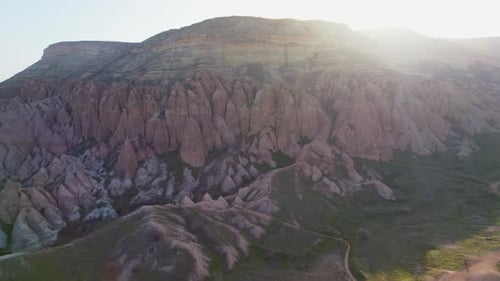 Natural Rock Formations Valley with Cave Houses in Cappadocia Drone Shot