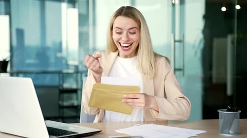 Woman Excited by News Received in Office
