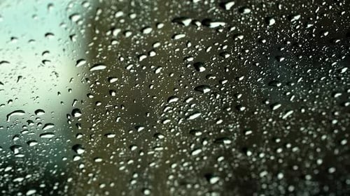 Water Drops Running Down Glass, Close Up