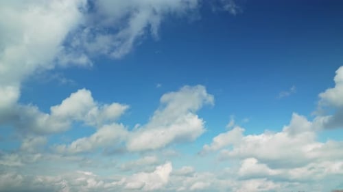 Clouds Flowing in Blue Daytime Sky