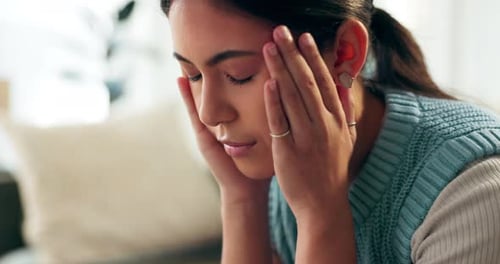 Woman, headache and temple pain in home or mental health struggle with stress fatigue
