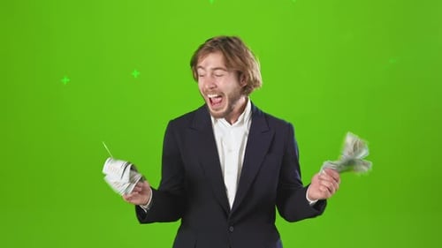 Young Businessman Standing Holding Money Currency in Studio