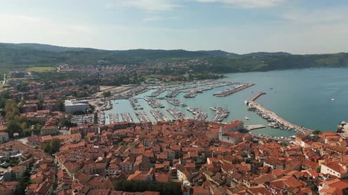 Aerial View of Coastal City Marina with Boats