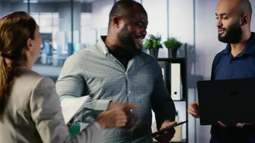 Business Professionals Shaking Hands and Reaching an Agreement
