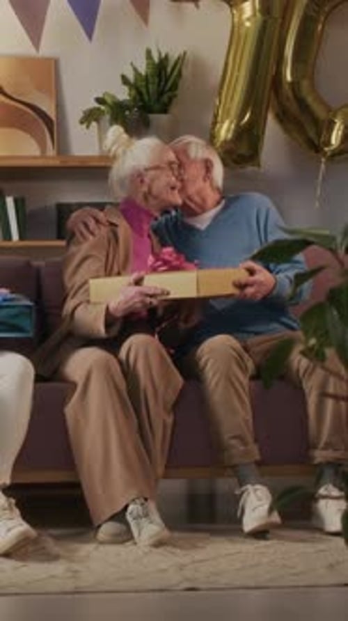 Senior Couple Celebrates Birthday with Friends and Family