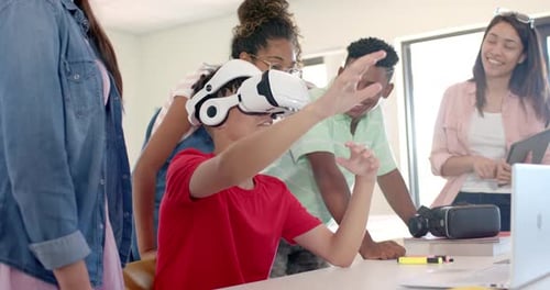 Diverse students engage in a VR experience at high school