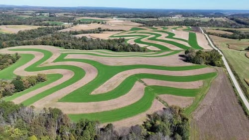 Contour Farming is a practice that involves performing farming across a field's slope. This includes