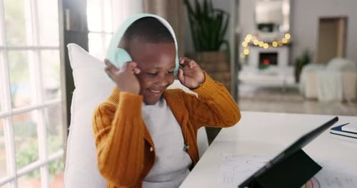 Headphones, music and child dancing with a tablet while watching a video on social media