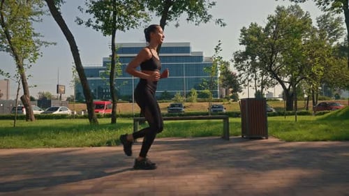Brunette Jogging in City