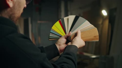 Portrait of Carpenter Man Choosing Color Palette Wood Worker on Furniture Factory Builder Wearing