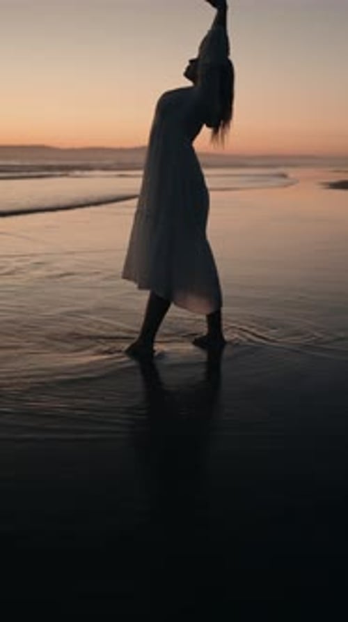 Woman Silhouette Beach Sunset