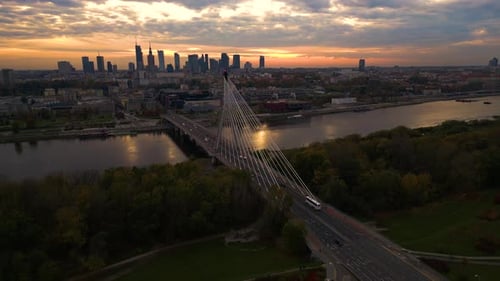 Beautiful panoramic aerial drone sunset view to Warsaw city center with skyscrapers and Swietokrzysk