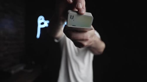 Flip magician card trick showoff at a indoor studio