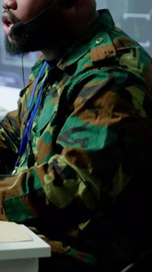 Serious Man Works in Technology Support Role