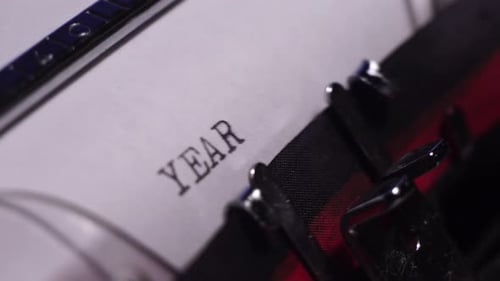 Year 1999, Typing on Blank White Paper in Vintage Typewriter, Close Up