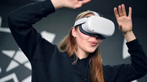 Woman Enjoys Virtual Reality Headset Experience