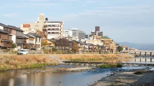 Cityscape skyline time lapse at Kamo river in a morning, Kyoto city, Japan.
