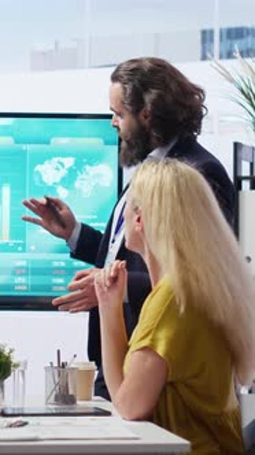 Vertical Video Broker Agent Showing Statistical Graphs About Stock Exchange Shares