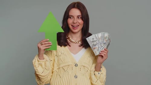 Smiling Woman Holding Cash and Upward Arrow
