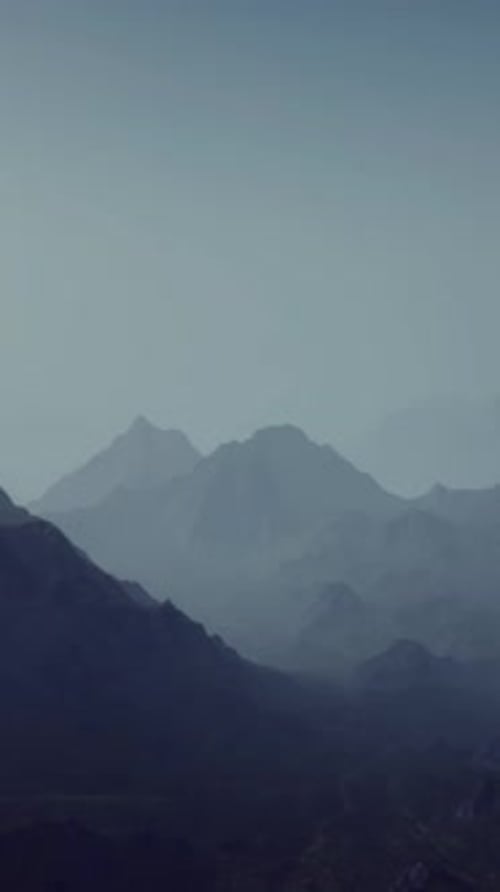 A Misty Mountain Range in the Fog