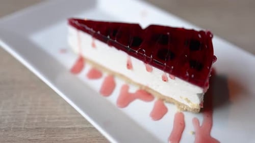Close-up of Delicious Cheesecake Slice with Berry Topping