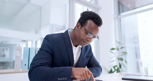 Business, black man and scroll on tablet in office for planning research